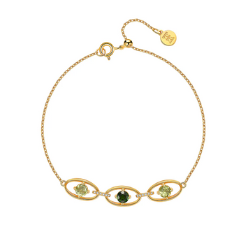 Peridot and diopside green gemstone bracelet
Gold chain bracelet with oval cut peridot stones
Natural green stone bracelet in 14K gold vermeil