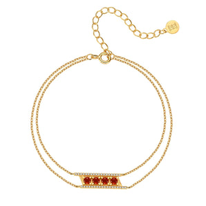 Spessartine garnet rectangular pendant bracelet
Red gemstone double chain bracelet in 14K gold vermeil
Delicate gold bracelet with garnet accent