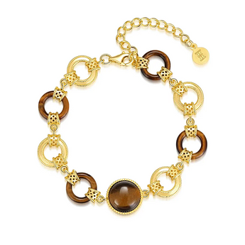 Tiger eye gemstone bracelet in 18K gold vermeil
Brown tiger eye stone gold lattice bracelet
Elegant adjustable bracelet with tiger eye center