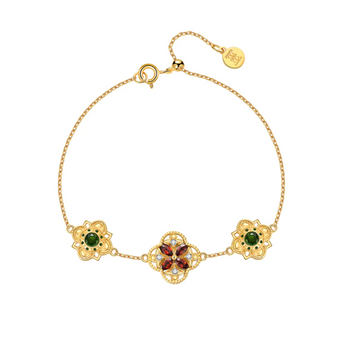 Red garnet floral bracelet in 14K gold vermeil
Vintage inspired gold bracelet with garnet flower
Green and red gemstone charm bracelet