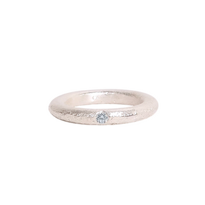 hammered silver ring with blue topaz stone
