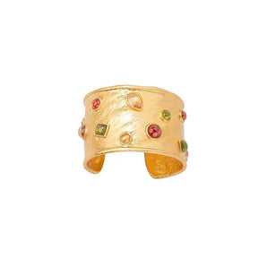 hammered gold bangle studded with multicolor glass stones and natural zircons in red, green, and amber, band width 4cm, adjustable inner diameter