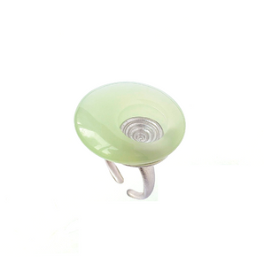 translucent mint green dome ring with embedded silver spiral coil, sculptural artisan design
