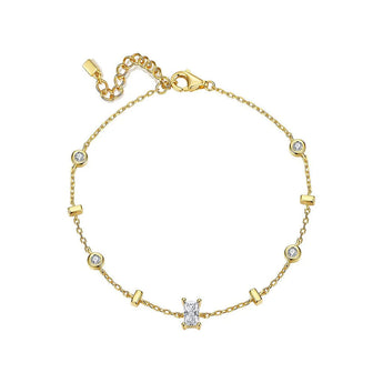 delicate gold bracelet with baguette crystal accent

