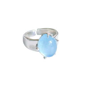 natural aquamarine cabochon solitaire ring in sterling silver, prong-set oval blue gemstone
